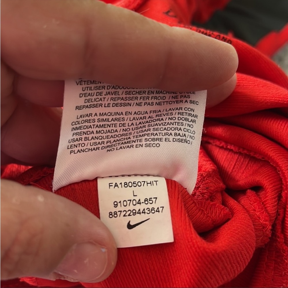 Red Nike athletic shorts